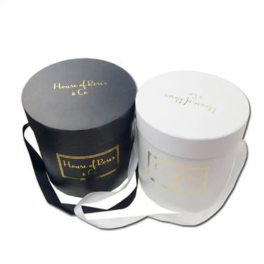 Кръгли кутии за цветя като подаръчни комплекти